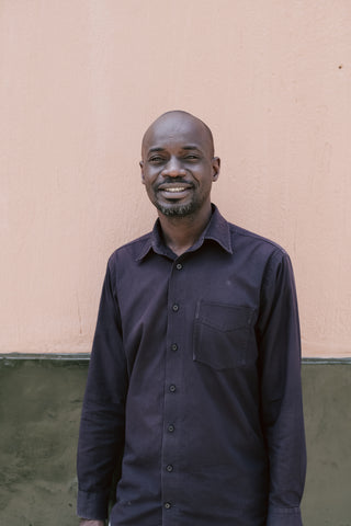 Kintu, tailor at Afriek